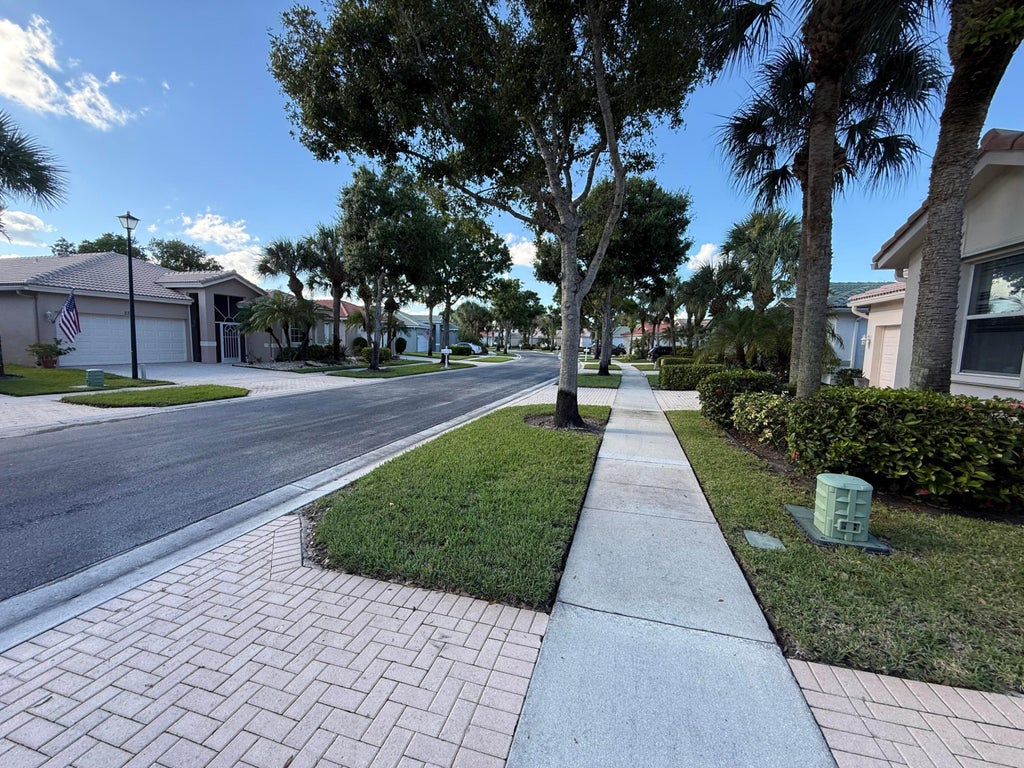 Photo of 2310 Sapphire Circle, West Palm Beach, FL 33411 (MLS # B26089408)