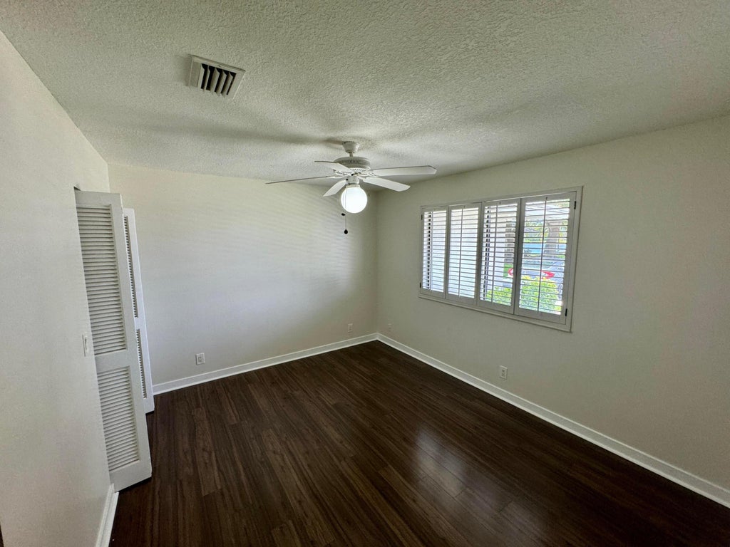 Photo of 112 Club Drive, Palm Beach Gardens, FL 33418 (MLS # R10990671)