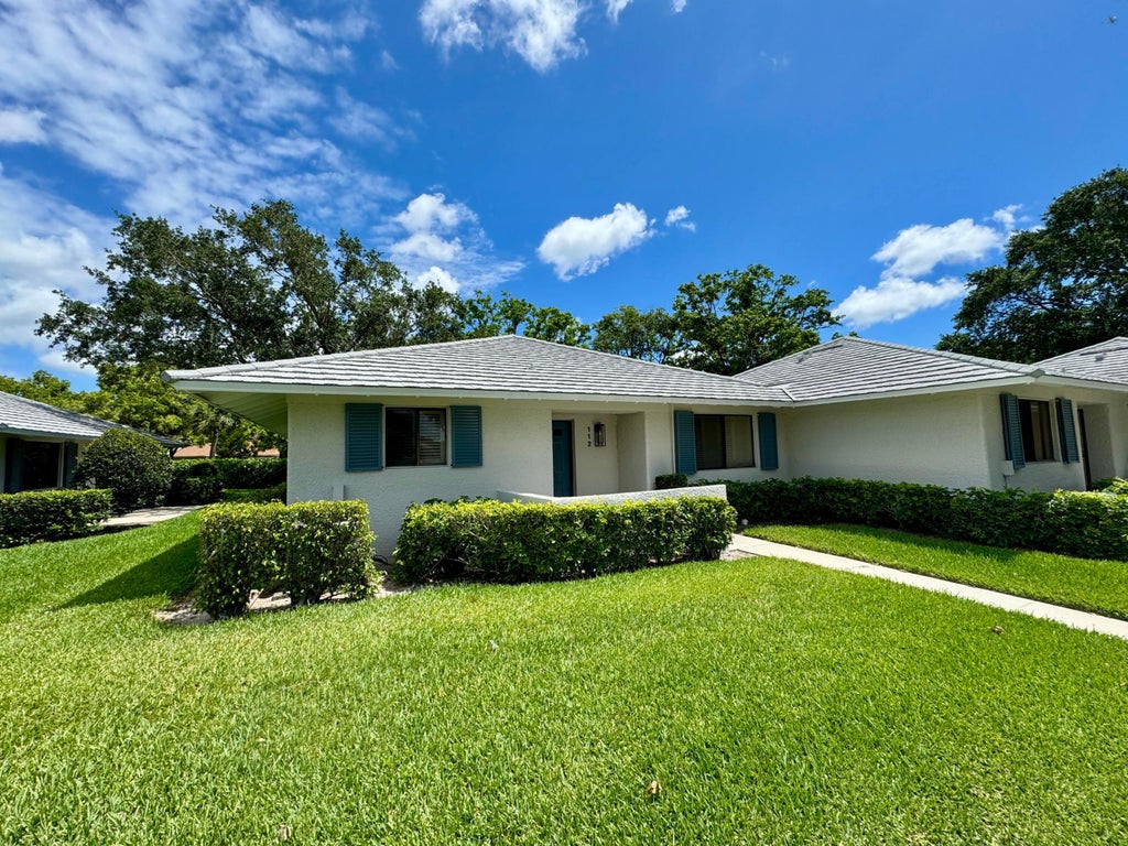 Photo of 112 Club Drive, Palm Beach Gardens, FL 33418 (MLS # R10990671)