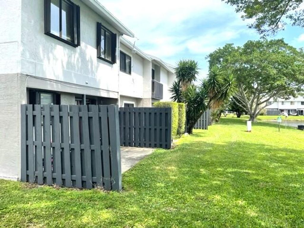 Photo of 2701 Canalside Drive, Greenacres, FL 33463 (MLS # R10967978)