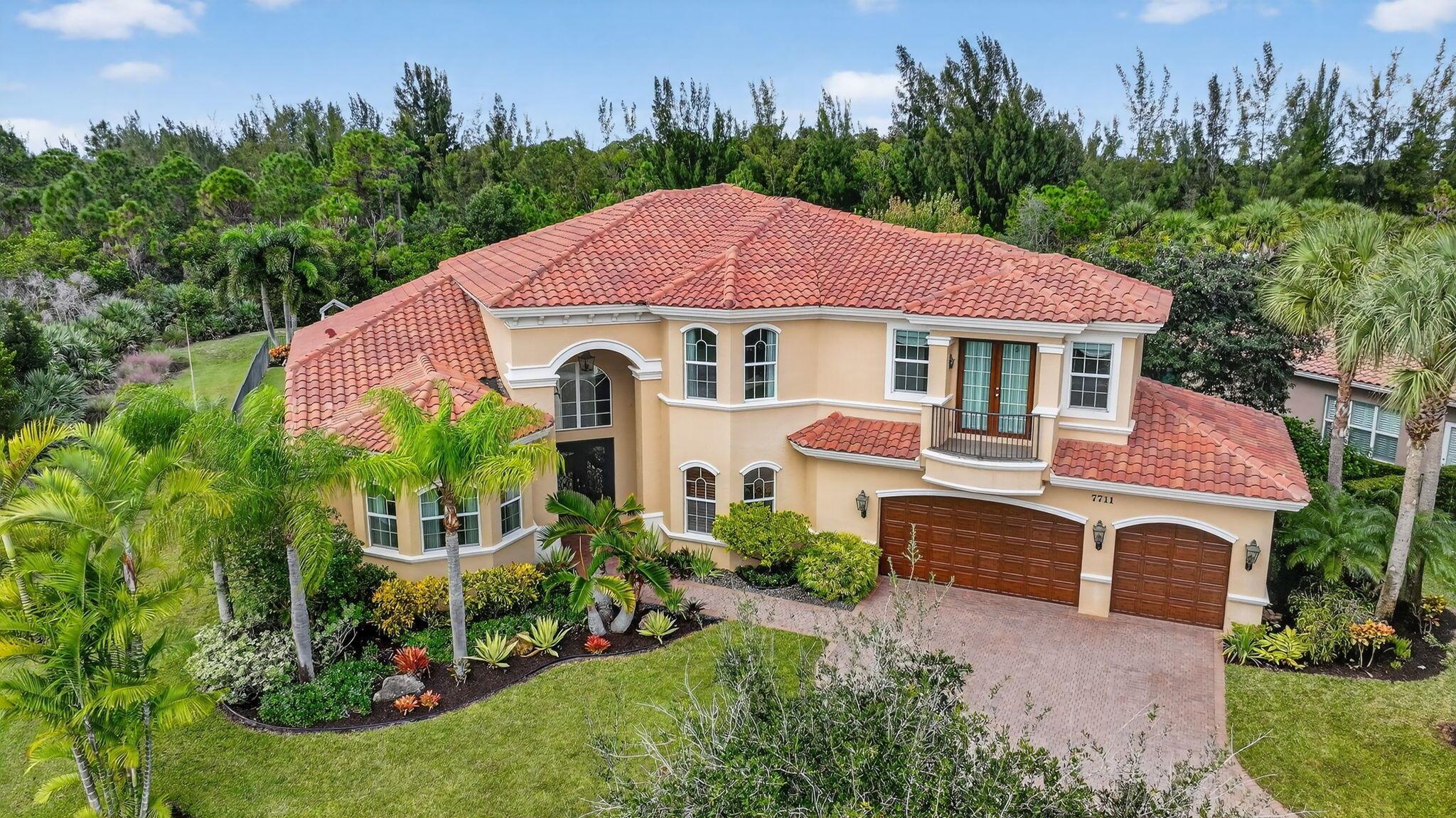 This  half acre cul-de-sac home is finished to an impeccable standard using extremely high-end materials. Luxury features such as custom built wood library, custom closet built ins, crown moldings, high end appliances and illuminated kitchen island. 2 primary bedrooms with spa like bathrooms. It strikes a perfect balance of luxury craftmanship and functional design, inviting unforgettable gatherings and serene family moments. From the dramatic foyer, wrought iron stair case and chef's kitchen to the tranquil master spa and resort- style outdoor spaces, every detail exudes sophistication and comfort. Indulge in a luxurious primary suite featuring a private sitting area, his/hers vanities & closets. This elegant home is surrounded on two sides by preserve. 500 gallon propane tank  generator
