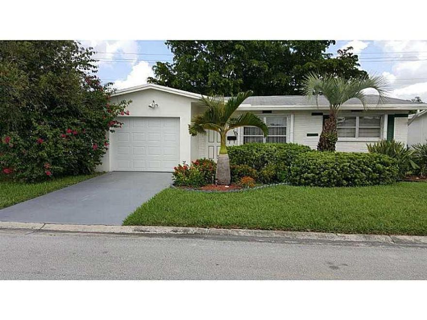 Beautiful spacious home on prime unique lot fronting and backing paved roads.  3 bedroom home, 3rd bedroom has no clothes closet.  Family room.  Home remodeled throughout - kitchen and baths, cupboards and granite, floors, appliances.  Large patio, beauti ful neutral paint, and landscaping.  55+ community. Call LA before preparing offer.