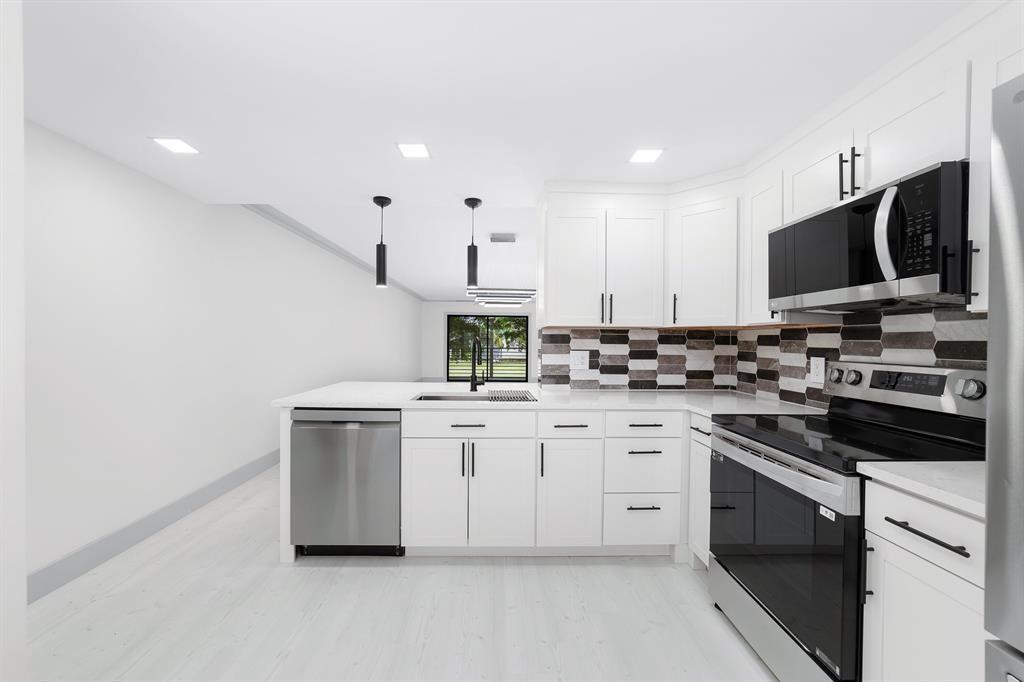 Come see this beautifully updated 2-bedroom, 2-bath condo in the highly sought-after Wynmoor 55+ community! With 1,156 sq. ft. of living space, this home features a bright, open layout and brand-new appliances throughout. You'll love the enclosed balcony, it's spacious and overlooks a peaceful garden, making it a great spot to relax. The unit is conveniently located close to the elevator and just steps from the pool. Wynmoor offers fantastic amenities, including a theater, fitness center, golf course, and tons of fun activities. Plus, you're just minutes from shopping, dining, and more. Don’t miss your chance to enjoy the active lifestyle this friendly, well-kept community has to offer. Schedule your tour today!