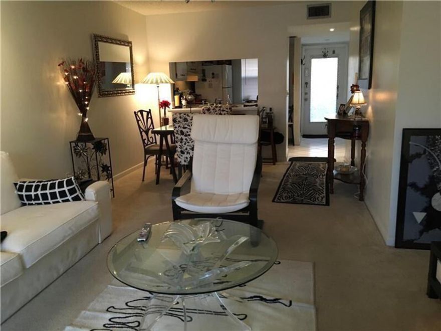 Lovely 2-bedroom, 2-bath condo located on the second floor in a desirable 55+ community in Sunrise. Features all tile flooring, beautiful lake views, and washer & dryer inside the unit. Enjoy resort-style amenities and a peaceful community lifestyle. Association approval required.