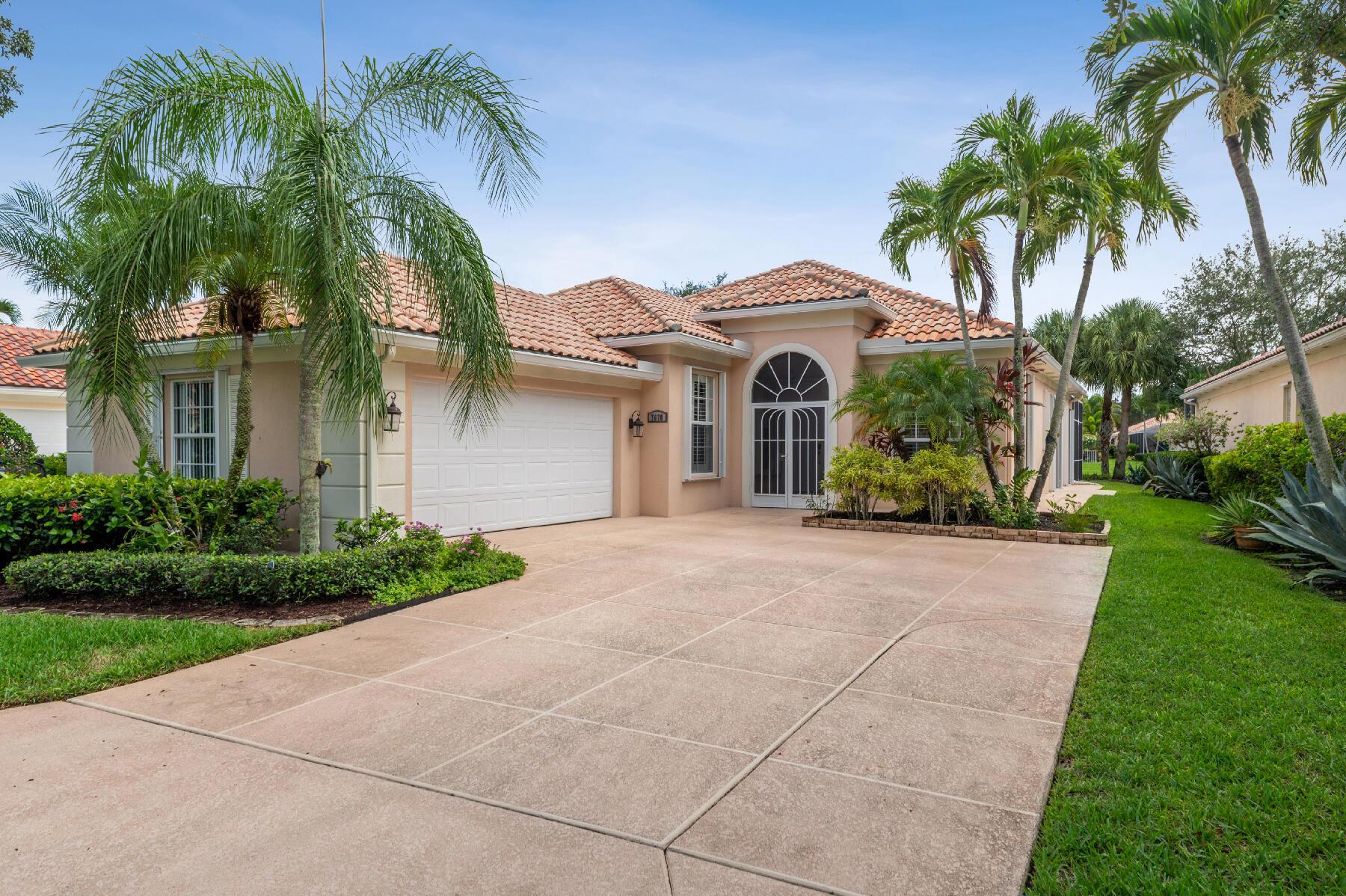 There are but, a few ''Crown Jewels'' that Glisten & Sparkle, with as many facets, as this Unique, Re-imagined & Skillfully Designed Oakmont that will Capture the Heart & Mind of One Lucky Buyer! This Gem is Set On A Gorgeous Wide, Lush Lakeside Lot! In the Fantastic 24 Hour Manned Gated Community of Riverwalk! One of the Best Locations in Palm Beach County, 15-20 minutes to Everything including Palm Beach, the Ocean & Airport! It's Impressive & Commanding Siting with a Lush Lawn & a Side Loading 2 Car Garage with an Enlarged & Expanded Motor Court leading to the Screened Entry with a Double Door & a Ceramic Tile Floor that opens to the Gracious Foyer! This is Just the Beginning! The Foyer, as well as The Entire Residence has Breathtaking Polished 24 Inch Porcelain Tile!