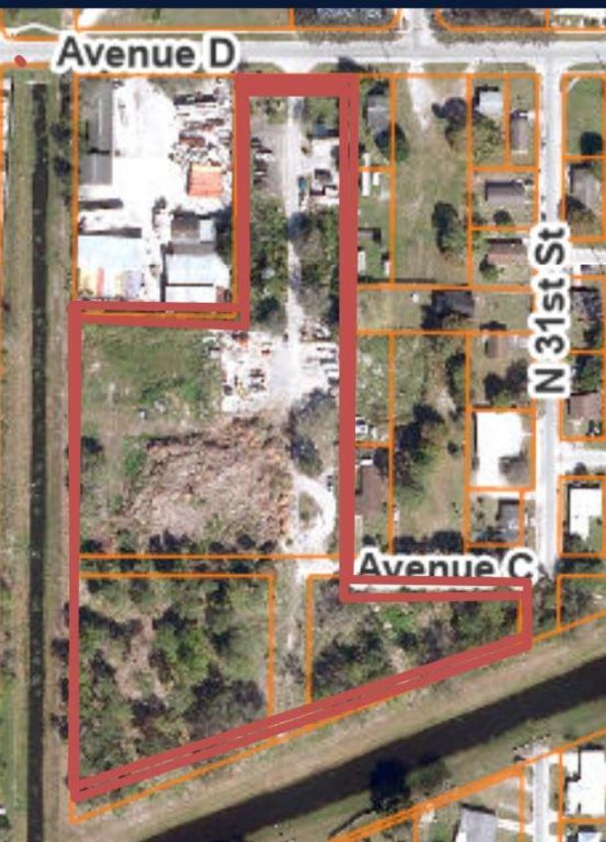 Prime commercial property located in the opportunity zone! This transaction consist of two parcels, and will ONLY be sold together. Total combined 6.37 acres of commercial land, with a split zoning. The front half is 3.74 acres of commercial. The rear 2.65 acres is zoned medium density, and bordered to the south by water.  A zoning variance will convert all to one or the other based on your needs and city approval. Great location for one business or a multi family development. 

Quick access to the expressway, downtown and the beaches. Call listing agent for details.