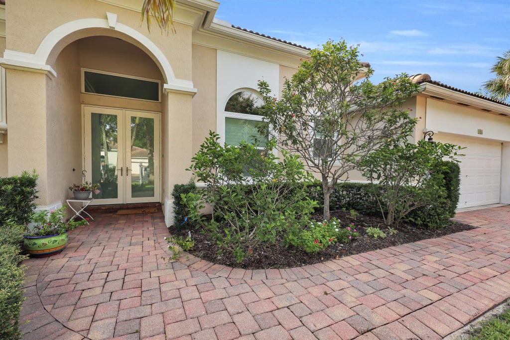 Photo of 103 MAGNOLIA Way, Tequesta, FL 33469 (MLS # B26074158)