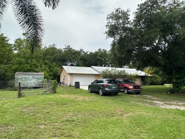 Light and Bright, Vaulted Ceilings, Tile Flooring, 3 Bedroom 2 Bath 2 Car Garage, CBS Construction, Split Floor Plan, Spacious Porch, Huge Fenced Yard, Shed, No HOA, Located on a Paved Corner Lot, Great Location, Must See