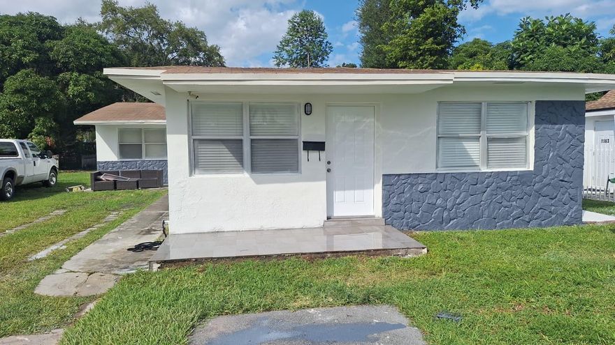 Amazing unit ready to move in. Everything is beautiful, with a huge driveway and patio, central A/C, washer and dryer, and private entrance. Oversized lot with mature landscaping provides ample space for outdoor enjoyment. Located just minutes from I-95, shopping, schools, and public transit. Owner will run the background check, no minimum credit required with strong proof of funds. Aditional $100 monthly flat fee for water.  The property is being painted outside and driveway in process of update. Come rent this unit, it won't last!