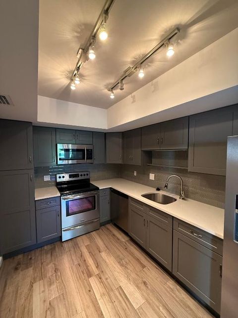 Photo of 11811 Avenue Of The Pga #1-1b, Palm Beach Gardens, FL 33418 (MLS # R11147456)