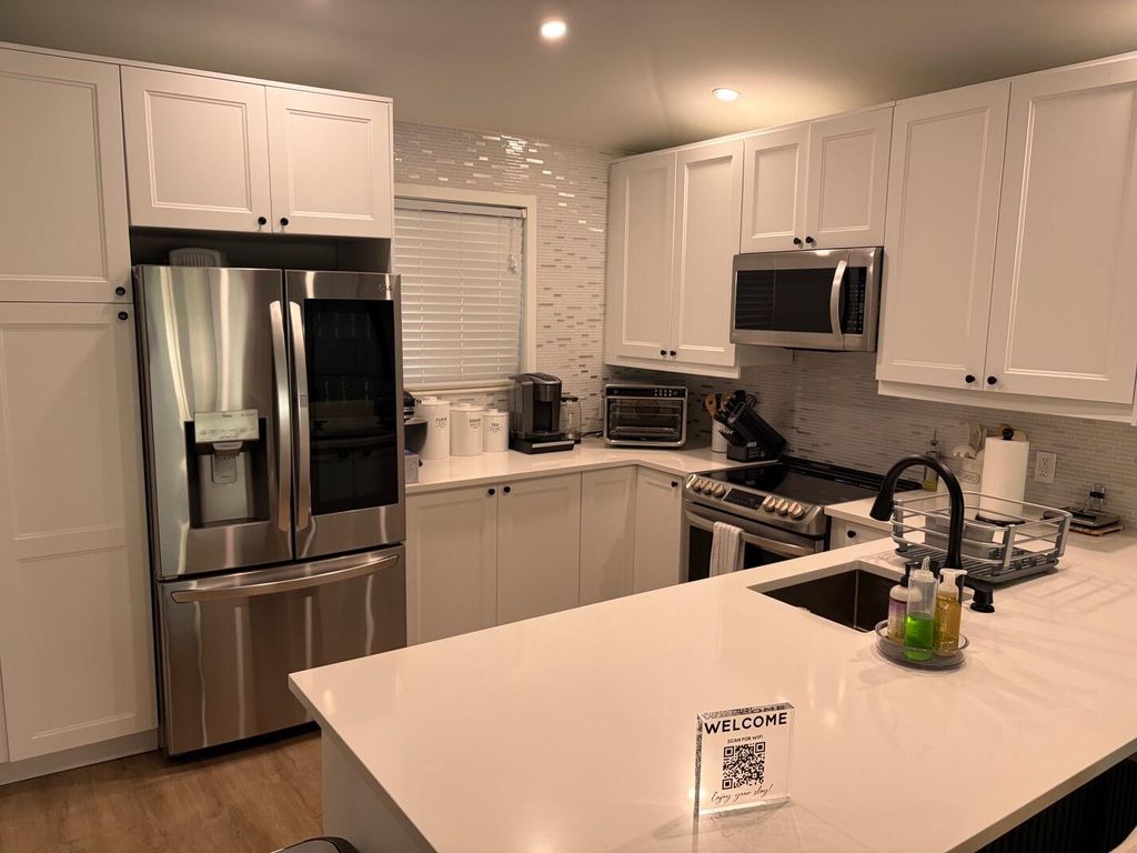 Photo of 202 Club Drive, Palm Beach Gardens, FL 33418 (MLS # R11146825)