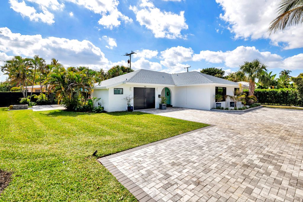 Photo of 300 Edmor Road, West Palm Beach, FL 33405 (MLS # R11164503)