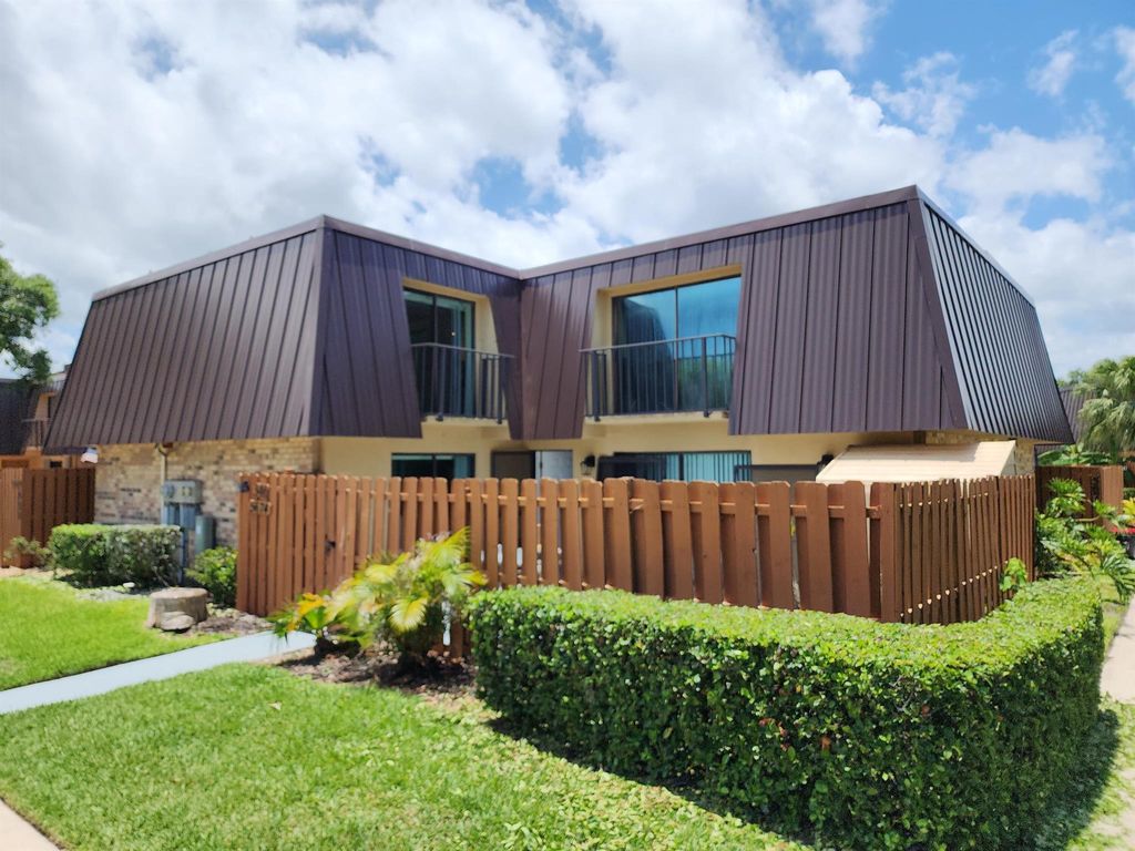 Photo of 5674 SE Windsong Lane, Stuart, FL 34997 (MLS # R10894257)