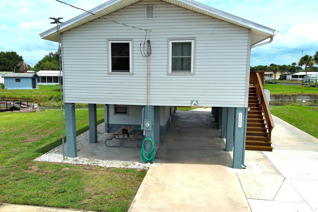 Photo of 1065 Peach Lane, Okeechobee, FL 34974 (MLS # B26039653)