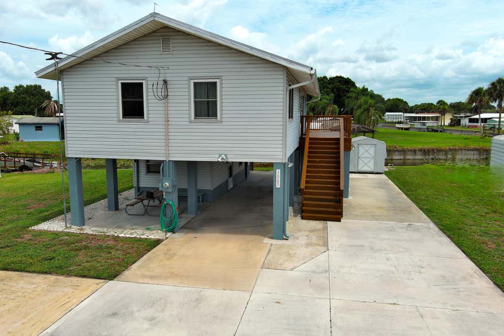 Photo of 1065 Peach Lane, Okeechobee, FL 34974 (MLS # B26039653)