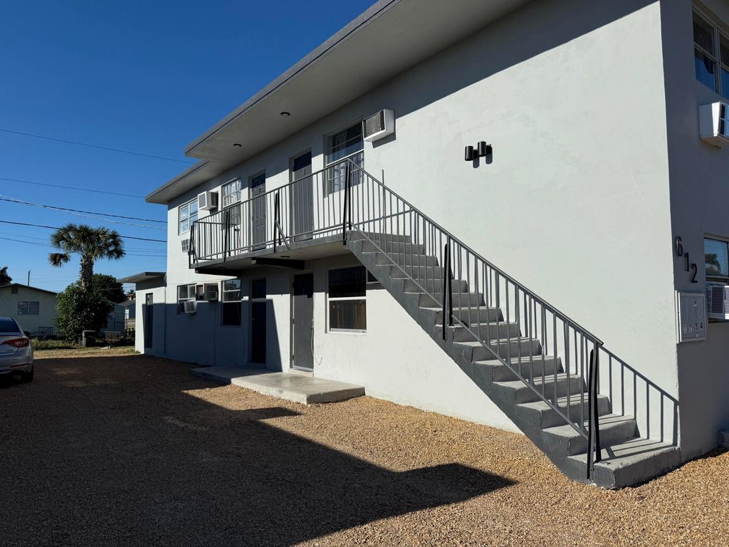 Photo of 612 SW 6th Street #1, Belle Glade, FL 33430 (MLS # R11043963)