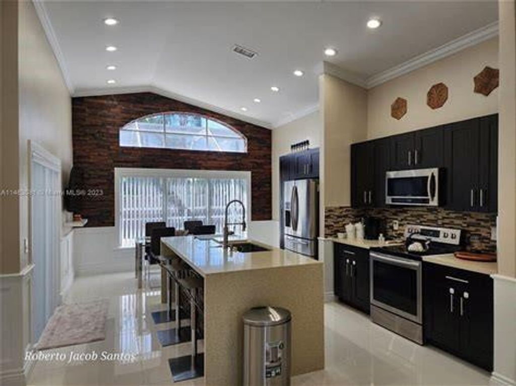 Photo of 5373 NW 55th Terrace, Coconut Creek, FL 33073 (MLS # F10520357)