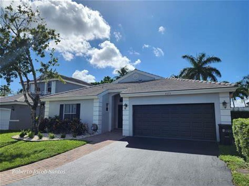 Photo of 5373 NW 55th Terrace, Coconut Creek, FL 33073 (MLS # F10520357)