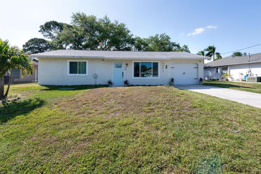Photo of 2492 SE Marius Street, Port St Lucie, FL 34952 (MLS # R10872120)