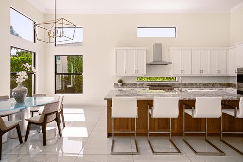 Photo of 2630 NW 69th Street, Boca Raton, FL 33496 (MLS # B26008263)
