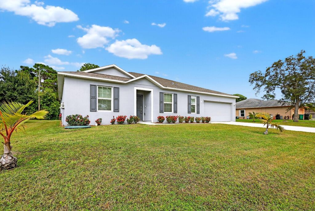Photo of 657 NE Horizon Lane, Port Saint Lucie, FL 34983 (MLS # R11116741)