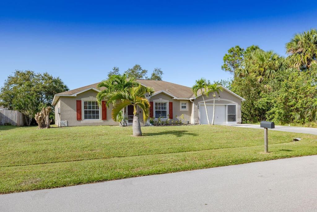 Photo of 3856 SW Cheribon Street, Port Saint Lucie, FL 34953 (MLS # R11037860)