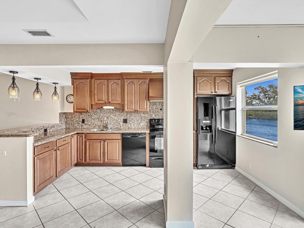 Photo of 4 Colonial Club Drive #202, Boynton Beach, FL 33435 (MLS # R11002161)