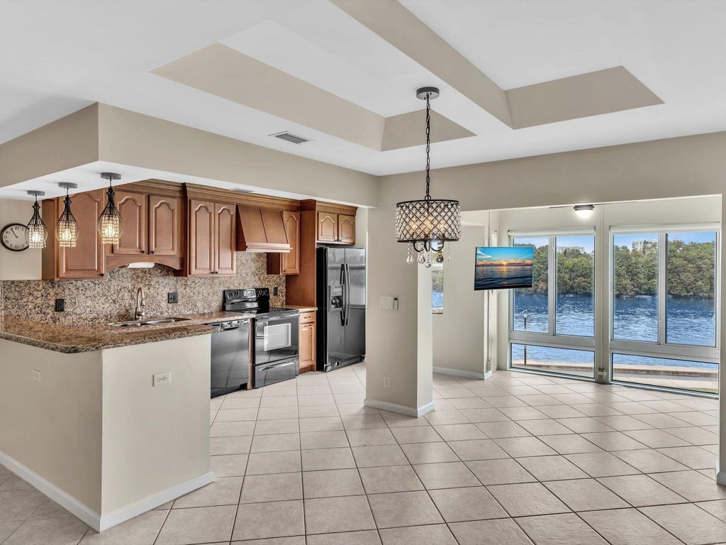 Photo of 4 Colonial Club Drive #202, Boynton Beach, FL 33435 (MLS # R11002161)