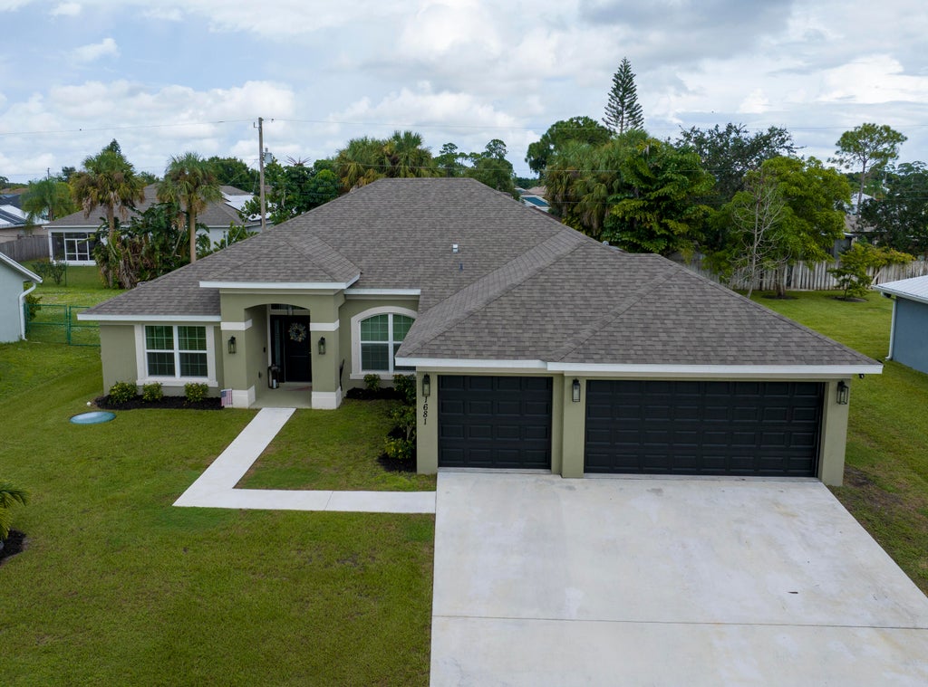 Photo of 1681 SW Salvatierra Boulevard, Port Saint Lucie, FL 34987 (MLS # R11076895)