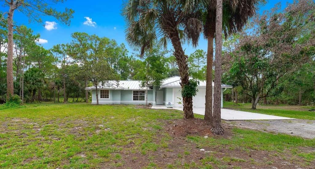 Photo of 15359 97th Road N, West Palm Beach, FL 33412 (MLS # B26056478)