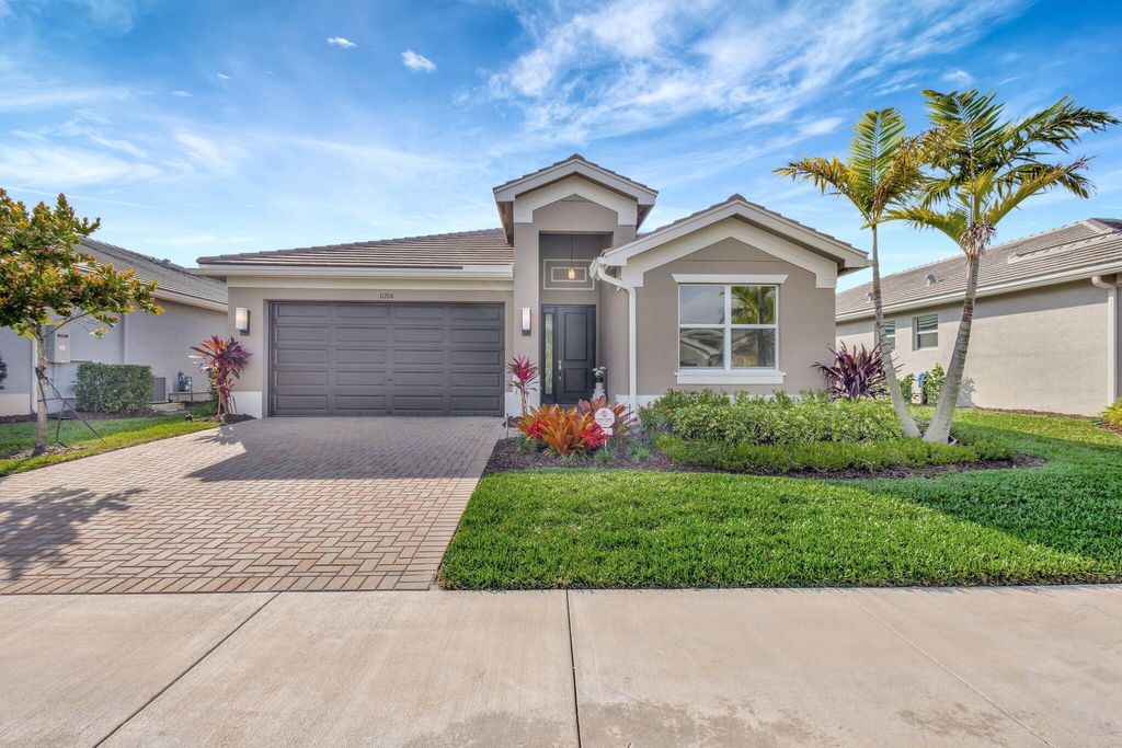 Photo of 11706 SW Oceanus Boulevard, Port Saint Lucie, FL 34987 (MLS # B26021541)