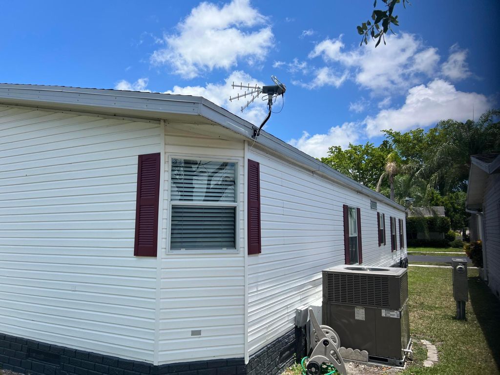 Photo of 6543 NW Nw 32nd Ave, Coconut Creek, FL 33073 (MLS # R10993909)