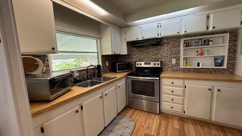 Photo of 7148 SE Seahawk Street, Hobe Sound, FL 33455 (MLS # R11136909)