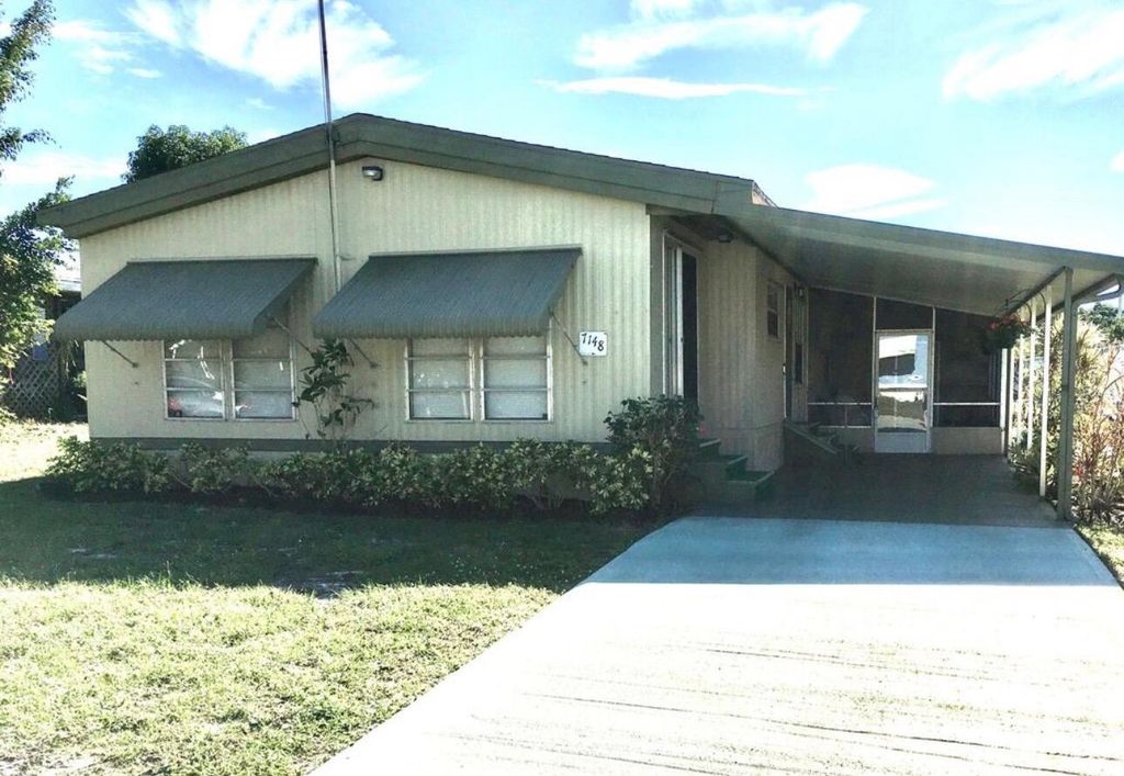 Photo of 7148 SE Seahawk Street, Hobe Sound, FL 33455 (MLS # R11136909)