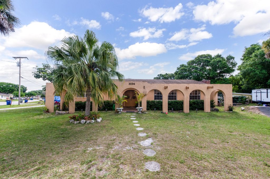 Photo of 3034 Fairway Drive, Fort Pierce, FL 34982 (MLS # R10778761)