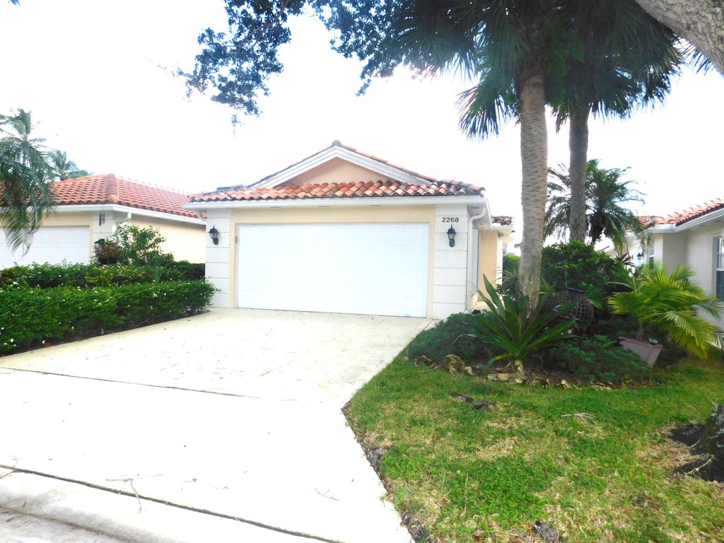 Photo of 2268 BLUE SPRINGS Road, West Palm Beach, FL 33411 (MLS # B26090117)