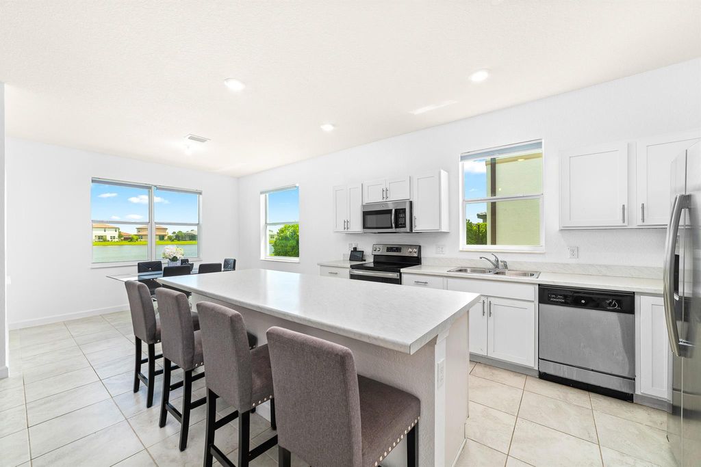 Photo of 12713 NW Milestone Place, Port St Lucie, FL 34987 (MLS # R10897035)
