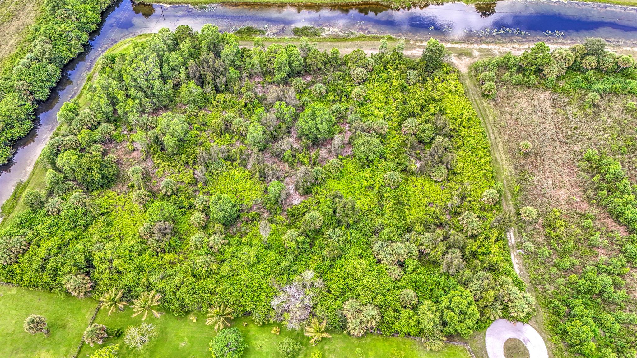 5-acre property in Deer Run. This lot is private and high and dry. Property is located at the end of the street with canal views on two sides of the property. Any uncleared part of the property doesn't need to be maintained and can offer great privacy.