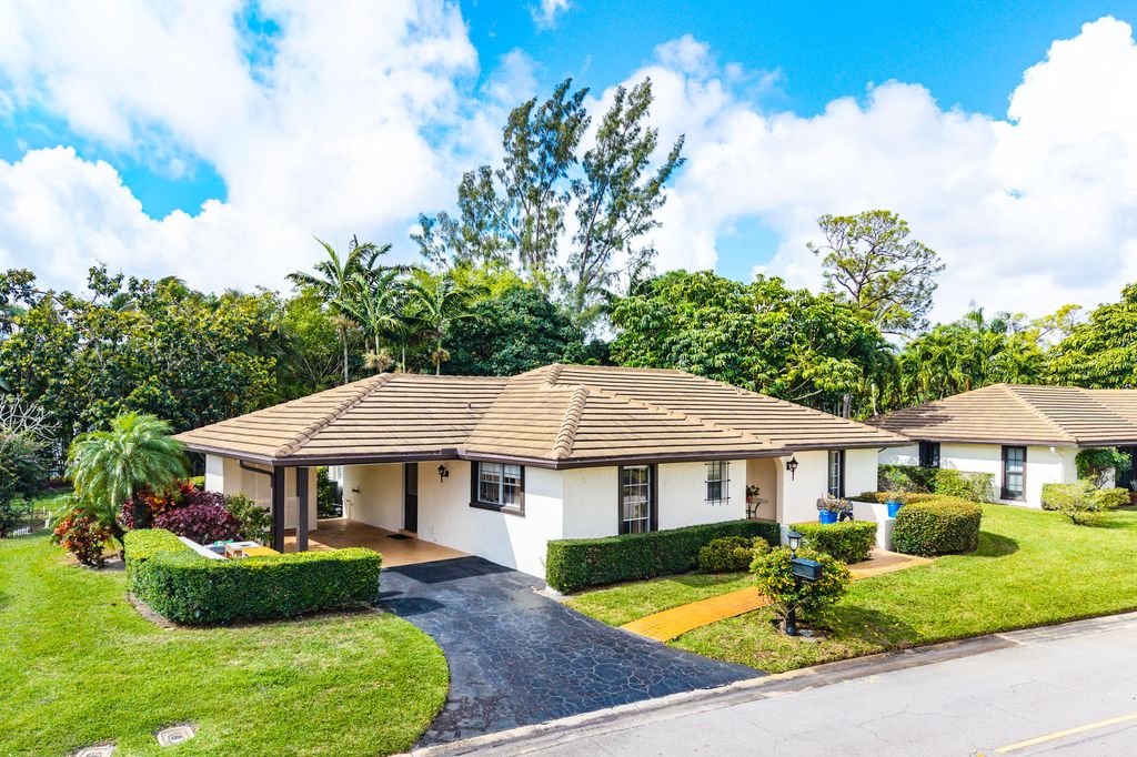 Photo of 446 Pine Villa Drive, Atlantis, FL 33462 (MLS # R11169787)