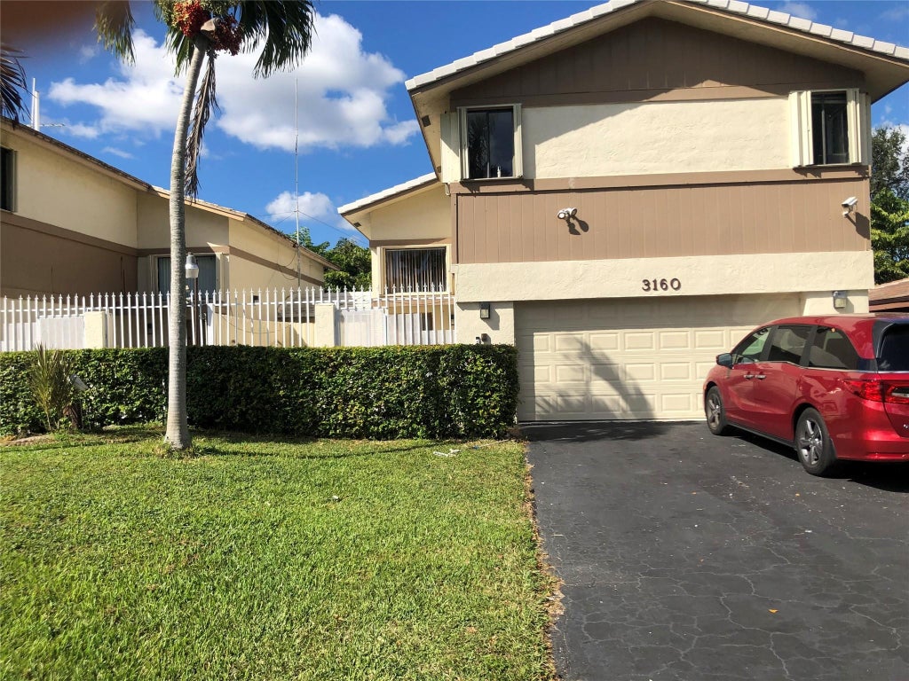 Photo of 3160 NW 116th Avenue, Coral Springs, FL 33065 (MLS # F10534382)