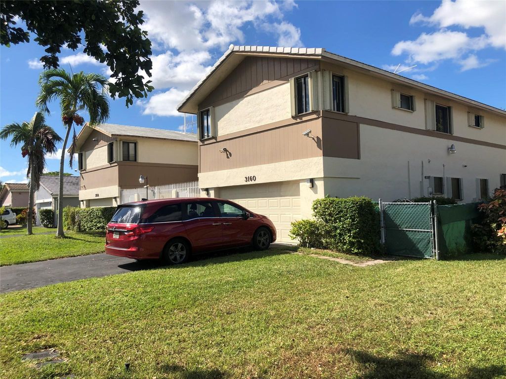 Photo of 3160 NW 116th Ave, Coral Springs, FL 33065 (MLS # F10534382)