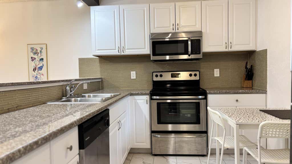 Photo of 5130 Las Verdes Circle #Apt 313, Delray Beach, FL 33484 (MLS # B26065466)