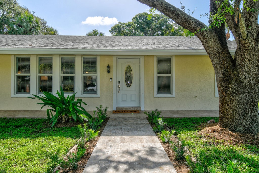 Photo of 13074 23rd Avenue N, Palm Beach Gardens, FL 33410 (MLS # B26036456)