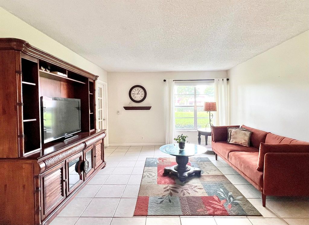 Photo of 12008 Poinciana Boulevard #106, Royal Palm Beach, FL 33411 (MLS # R11121142)