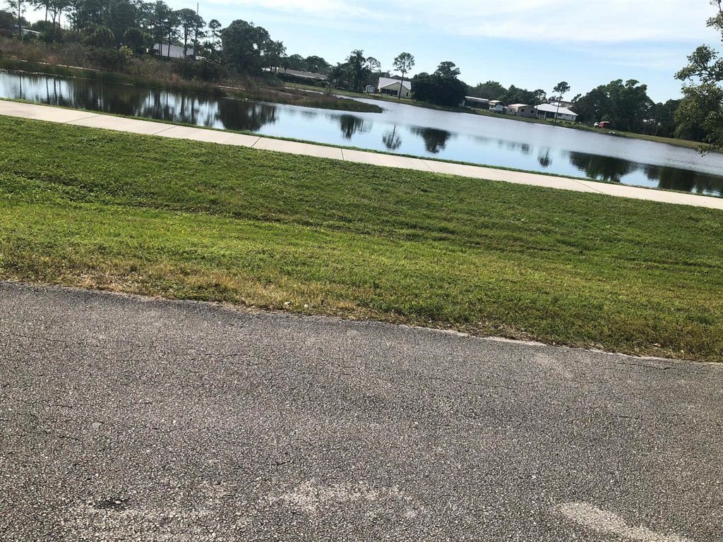 Photo of 1415 SW Ulmus Place, Palm City, FL 34990 (MLS # R11061650)