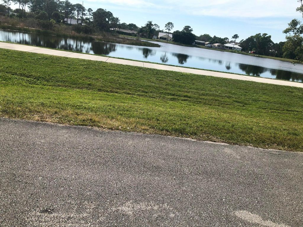 Photo of 1415 SW Ulmus Place, Palm City, FL 34990 (MLS # R11061650)