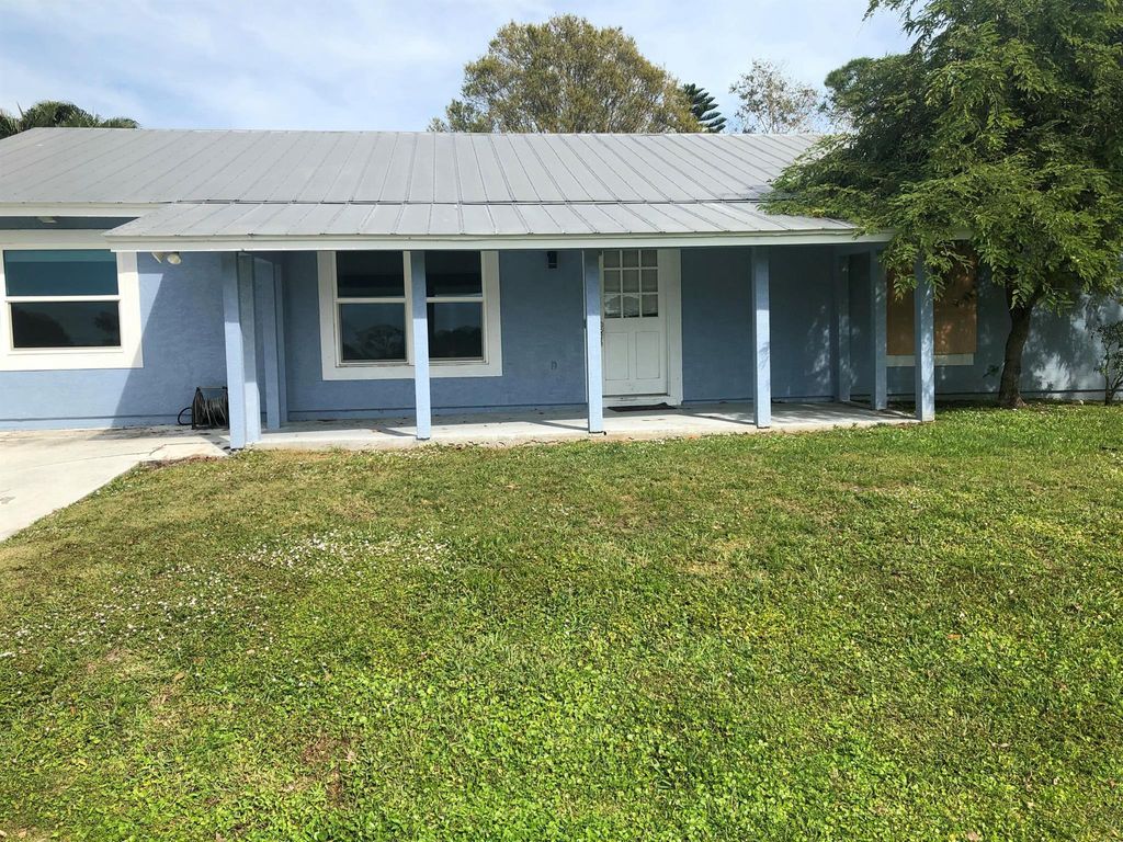 Photo of 1415 SW Ulmus Place, Palm City, FL 34990 (MLS # R11061650)