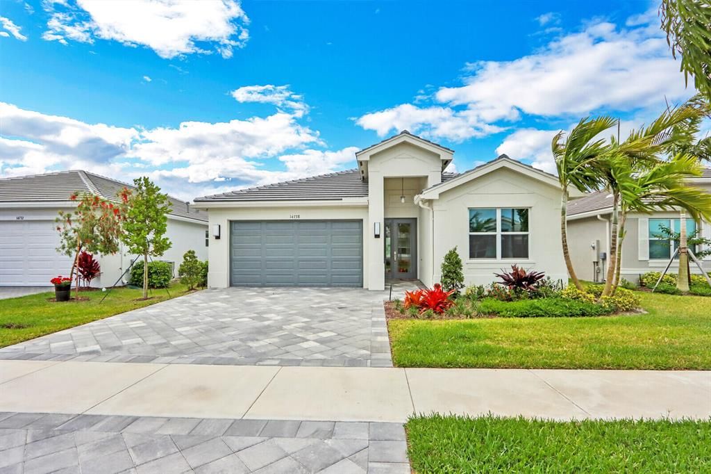 Photo of 14738 SW Surf Springs Way, Port Saint Lucie, FL 34987 (MLS # R10792903)