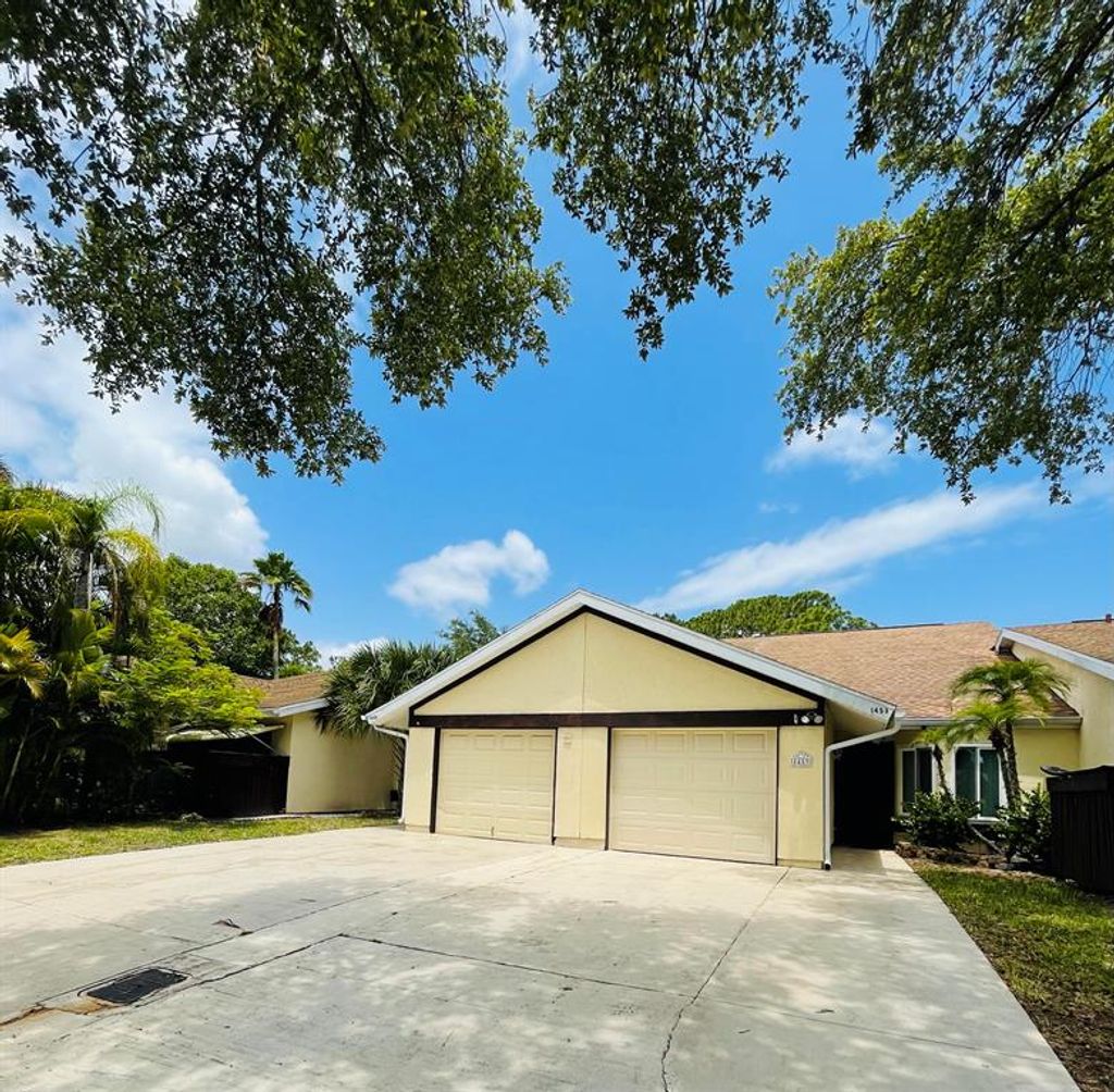 Photo of 1449 SE Rivergreen Circle, Port Saint Lucie, FL 34952 (MLS # R10718227)