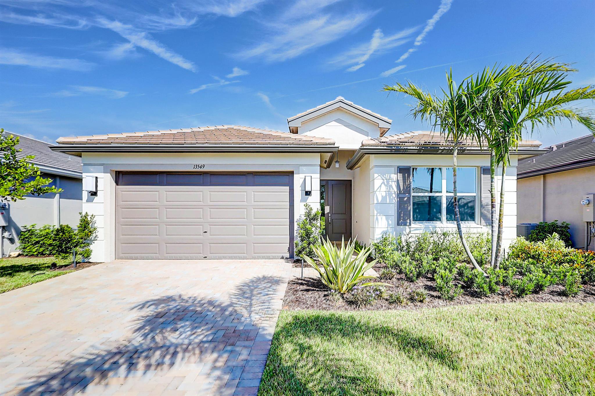 BRAND NEW Single Family Home. PSL's premier & newest Resort Lifestyle 55+ community. Enjoy the 34,000 sqft clubhouse, indoor/outdoor restaurant and bar, pool, hot tub, firepit, 51,000 sqft fitness campus with 4 pools, including pickleball, tennis, bocce and the Paseo for walking, biking and golf cart, 5 acres Arts & Culture center. This Model boasts 2 bedrooms plus a den with walkin closets, 2 bath, 2 car garage. Beautiful tile in living areas, upgraded luxury carpet in bedrooms, gas stainless steel appliances, lanai. You are just 5 minutes from, shopping, restaurants at Downtown Tradition and Cleveland Clinic. Plus, sandy beaches, golf, fishing all within a 20-30 minute drive.